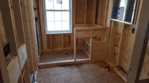 Unfinished bathroom with marble accents