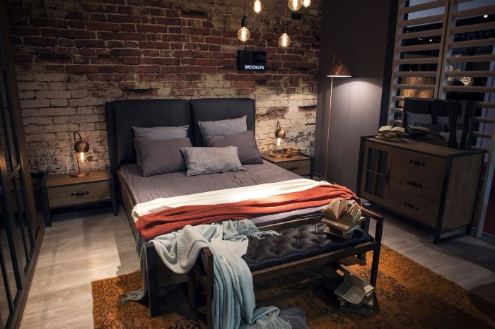 Industrial style bedroom with leather furniture