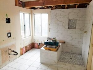 Unfinished bathroom with bathtub